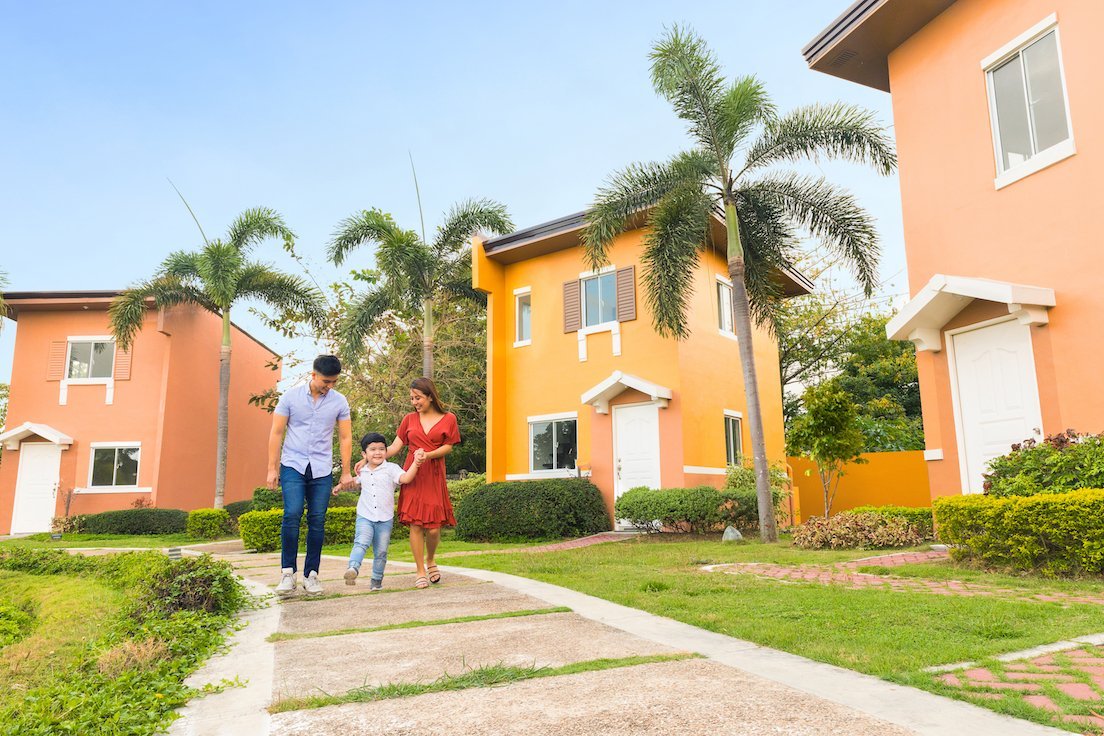 family enjoying strolling in lessandra affordable house and lot community