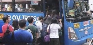 people riding a bus